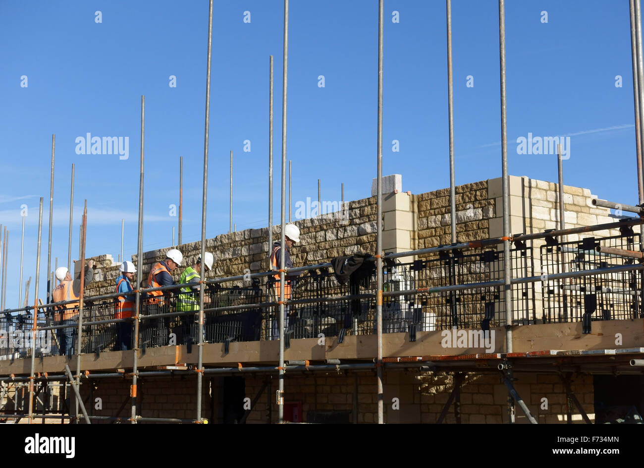workmen building a new house Stock Photo