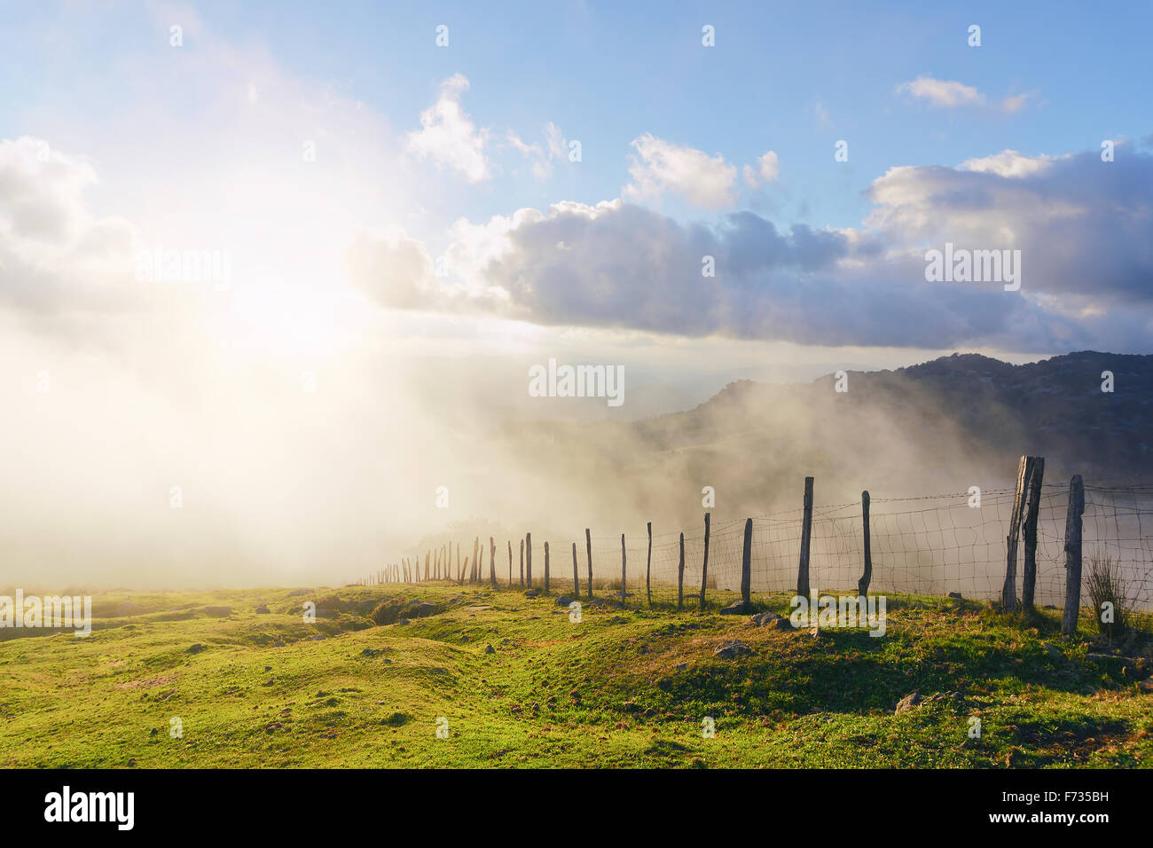 Wooden gate with sun hi-res stock photography and images - Alamy