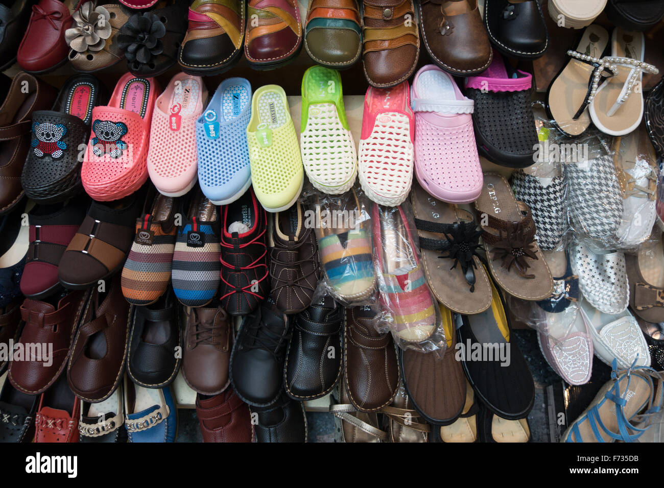 asian market selling flip flop Stock Photo