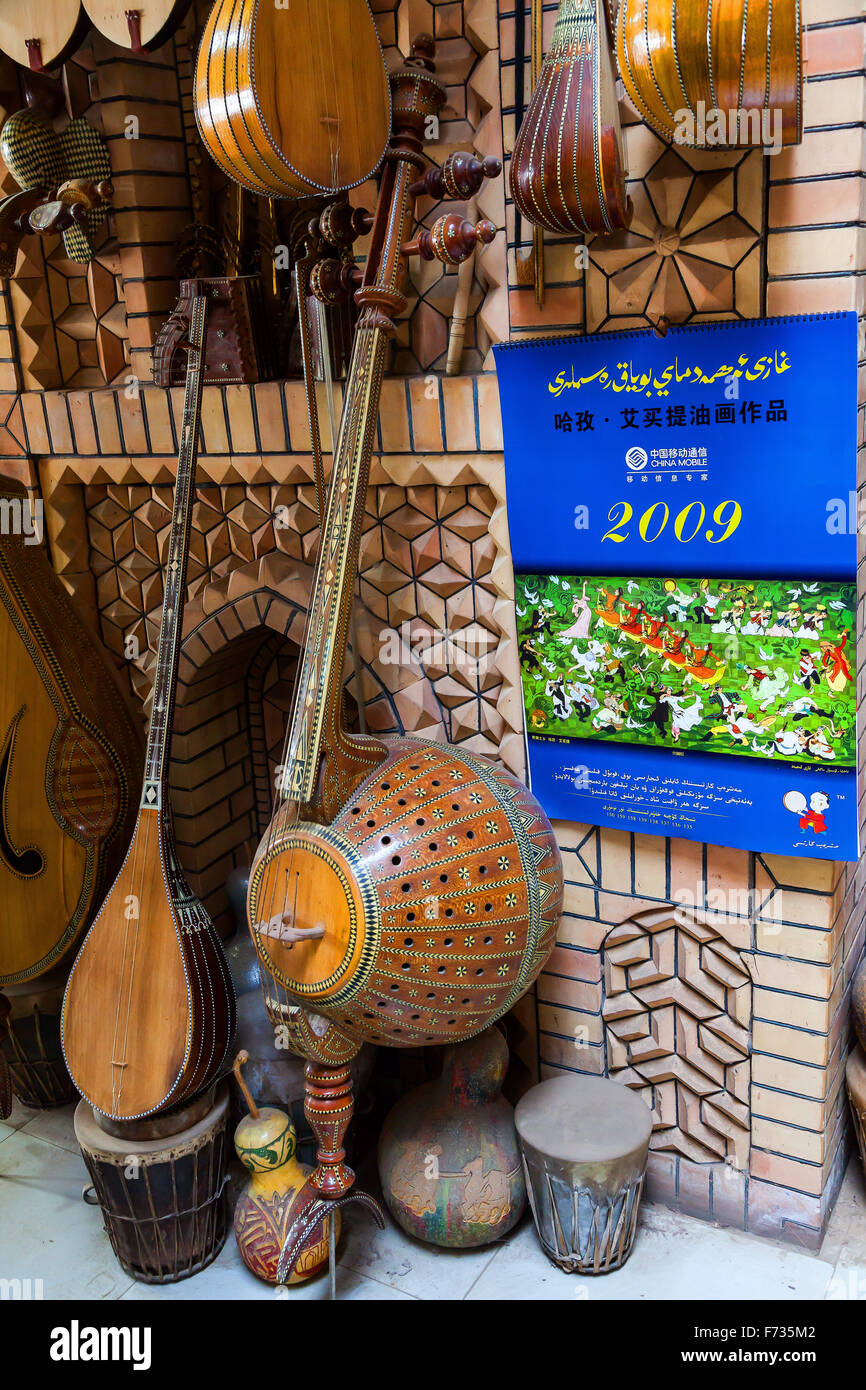 Music instrument shop,  Kashgar Old Town, Xinjiang Uighur Autonomous Region, China. Stock Photo