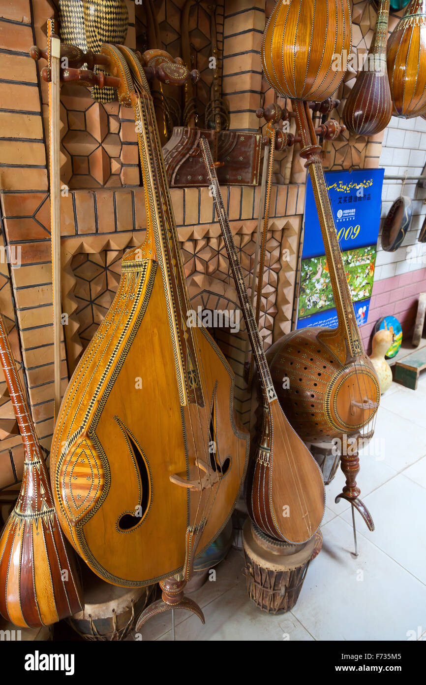Music instrument shop,  Kashgar Old Town, Xinjiang Uighur Autonomous Region, China. Stock Photo