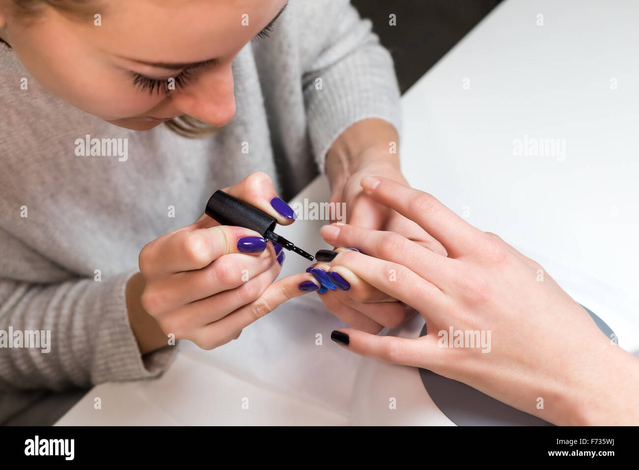 Step manicure process nail covering gel polish Stock Photo Alamy