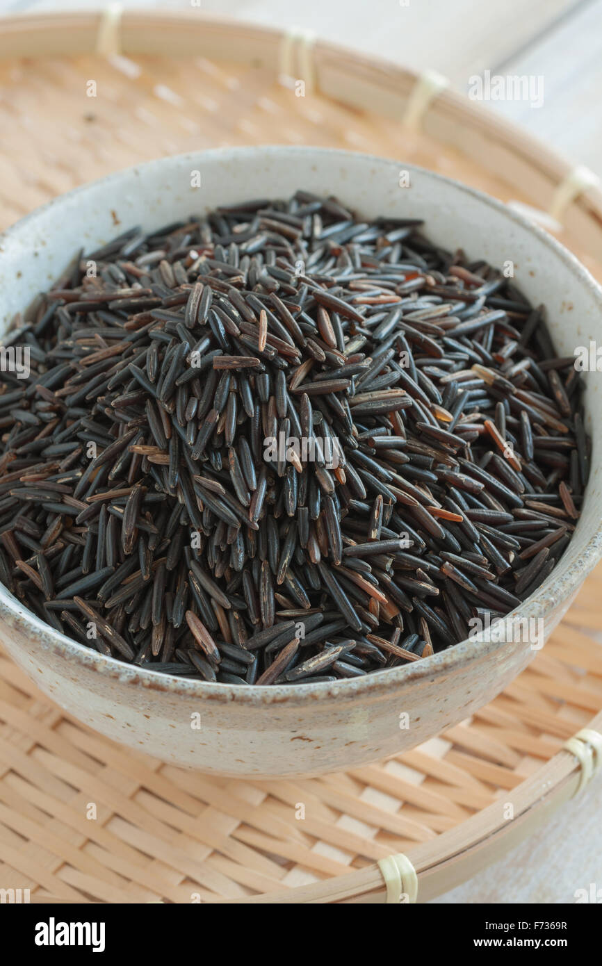 Wild rice also called Canada rice Indian rice and water oats a wild growing variety from North America and Canada Stock Photo