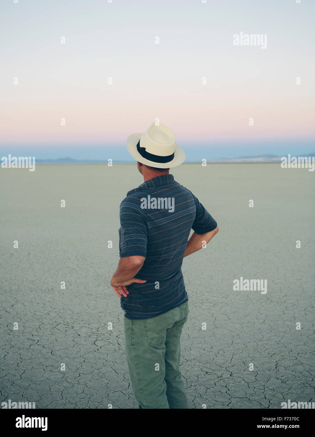 Middle aged man at dawn in the Black Rock Desert, Nevada Stock Photo