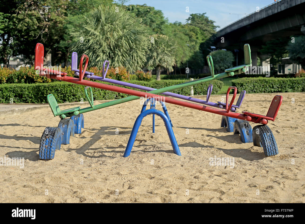 old seesaw or teeter-totter in kids playground Stock Photo