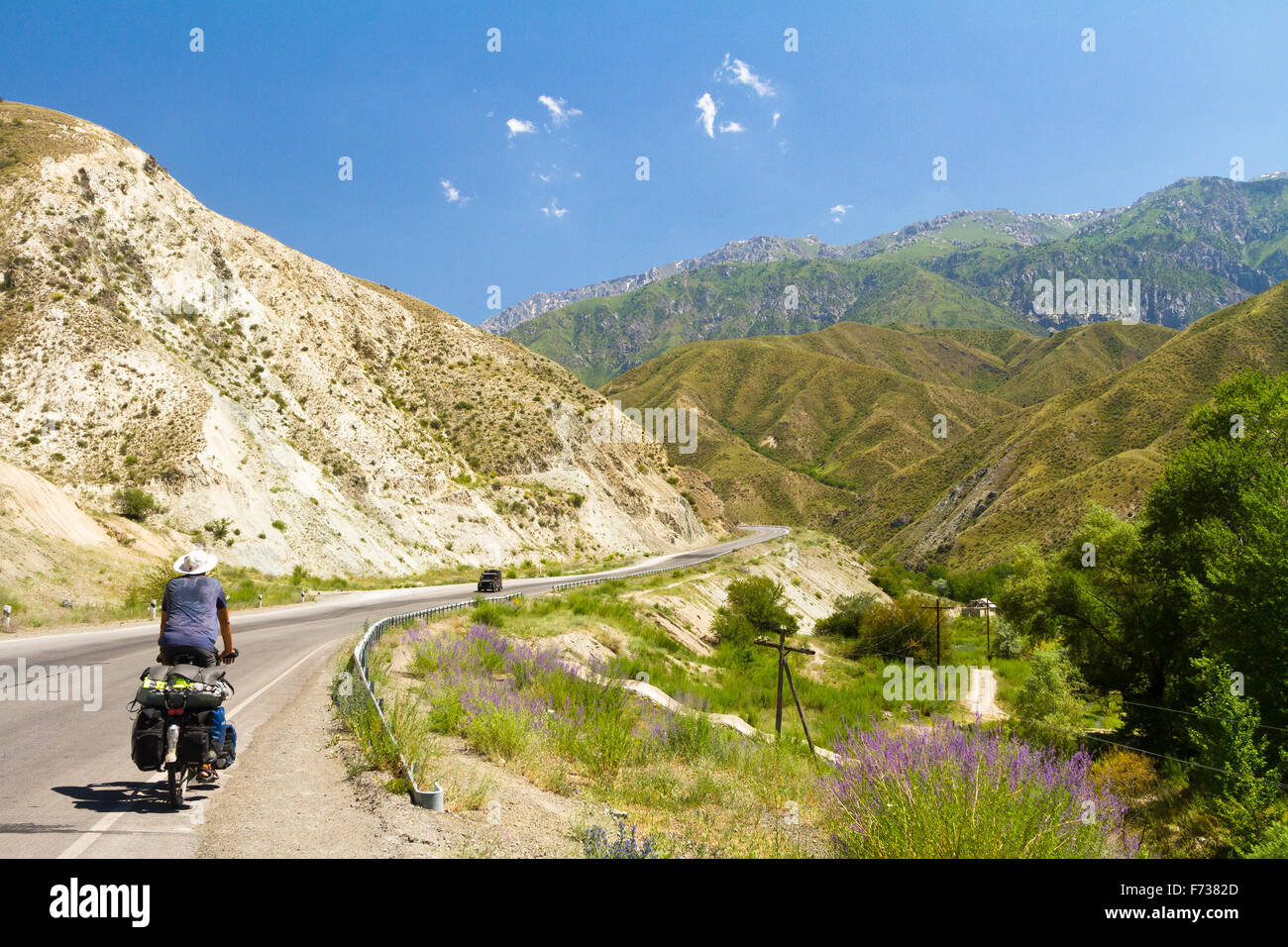 Bike Touring in Kyrgyzstan towards Ala-Bel Pass then onto Bishkek. - Stock Image