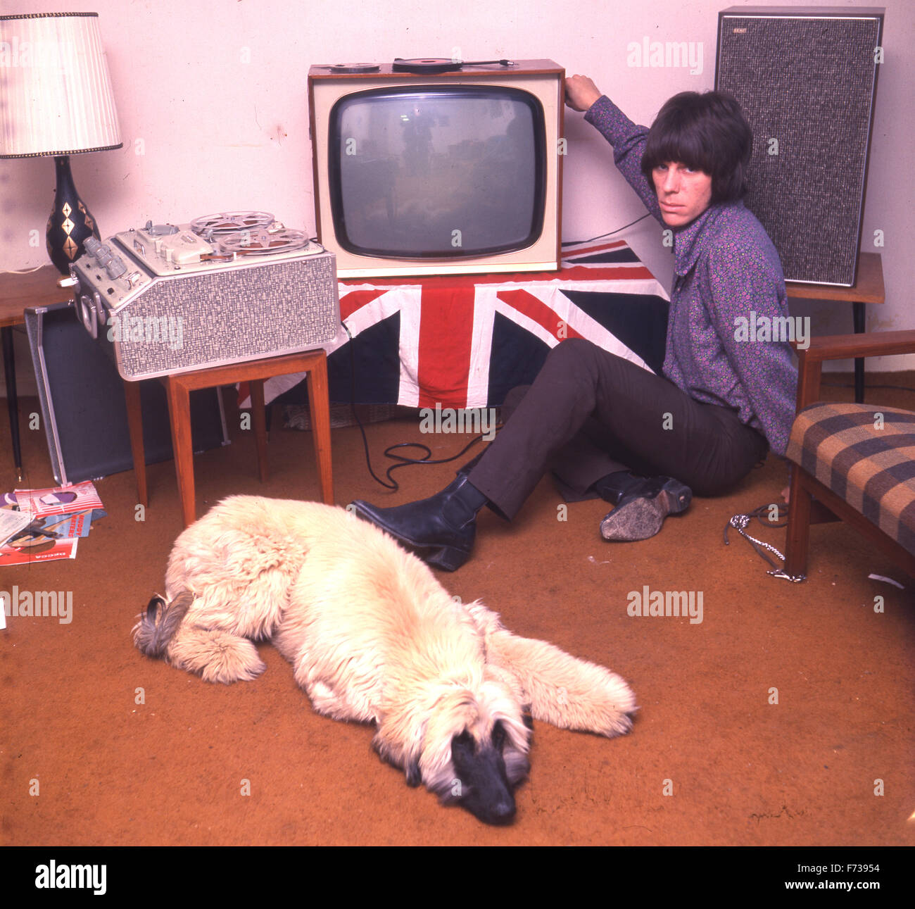 JEFF BECK English rock guitarist at his home in Sutton, Surrey,  in May 1967 with his Afghan hound "Pudding". Photo Tony Gale Stock Photo