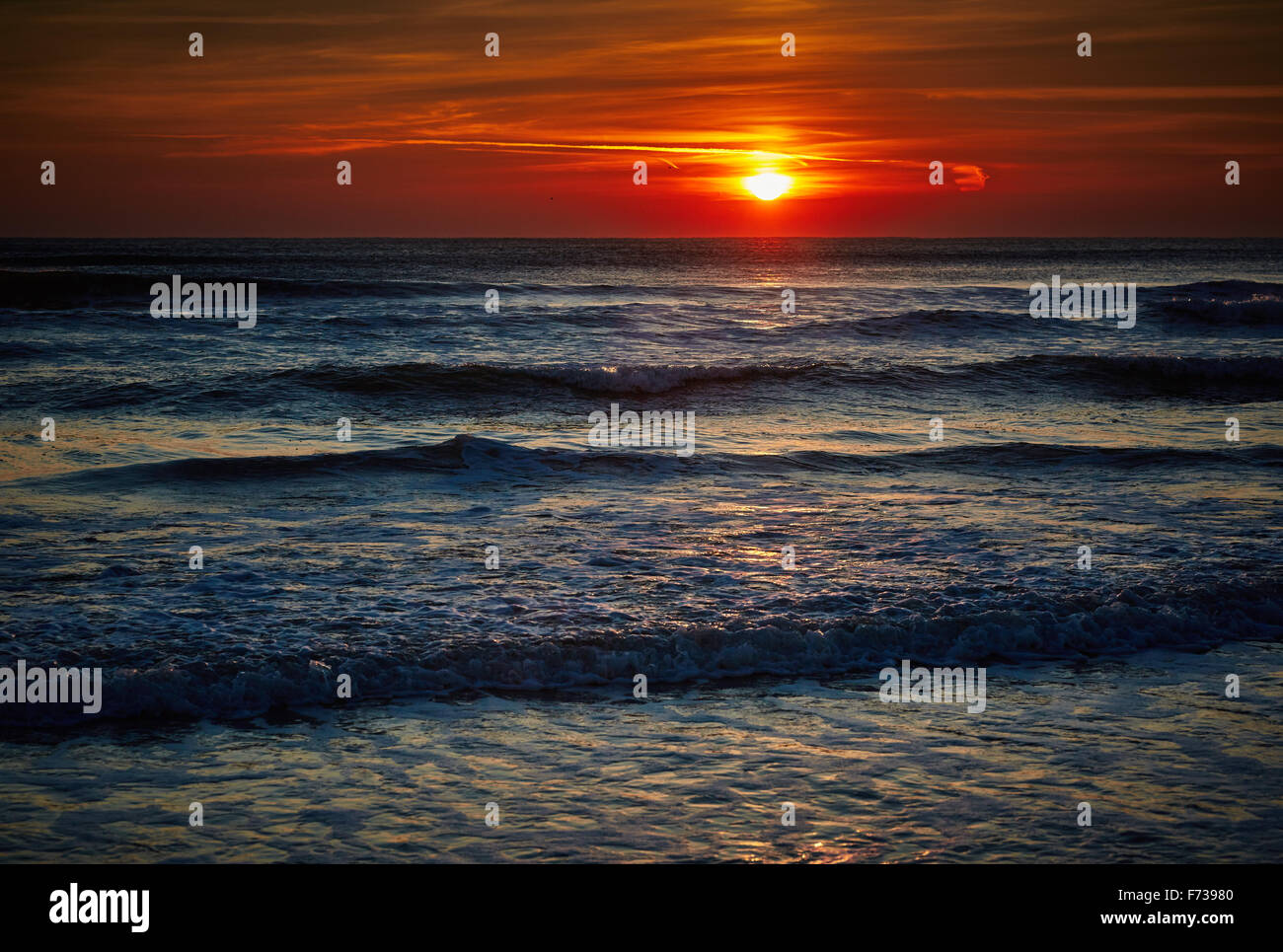 Majestic view of a colorful sunrise over the sea Stock Photo - Alamy