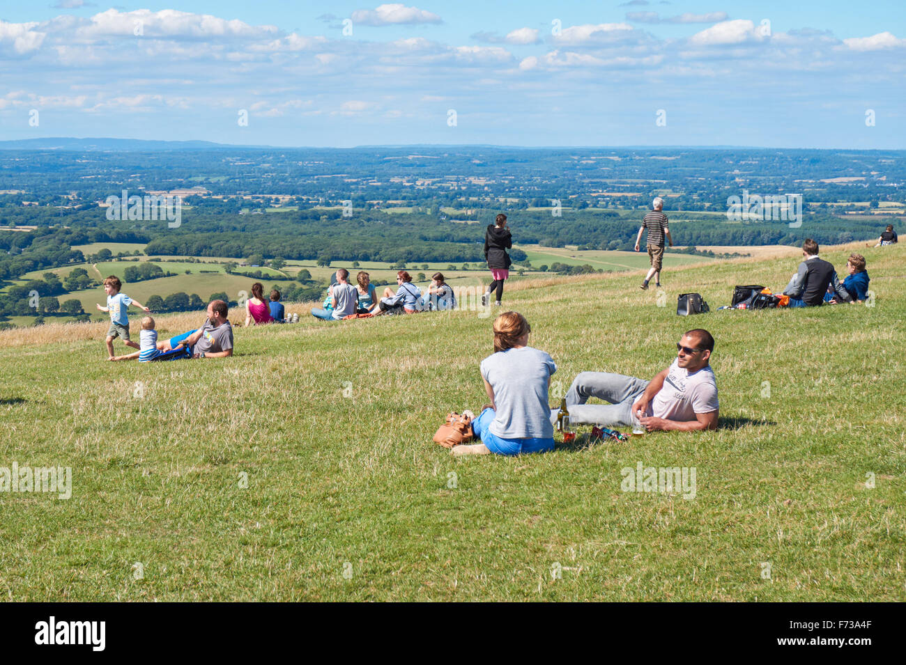 Tourists enjoying view from The Devils Dyke on the South Downs Way, the South Downs National Park East Sussex England United Kingdom UK Stock Photo