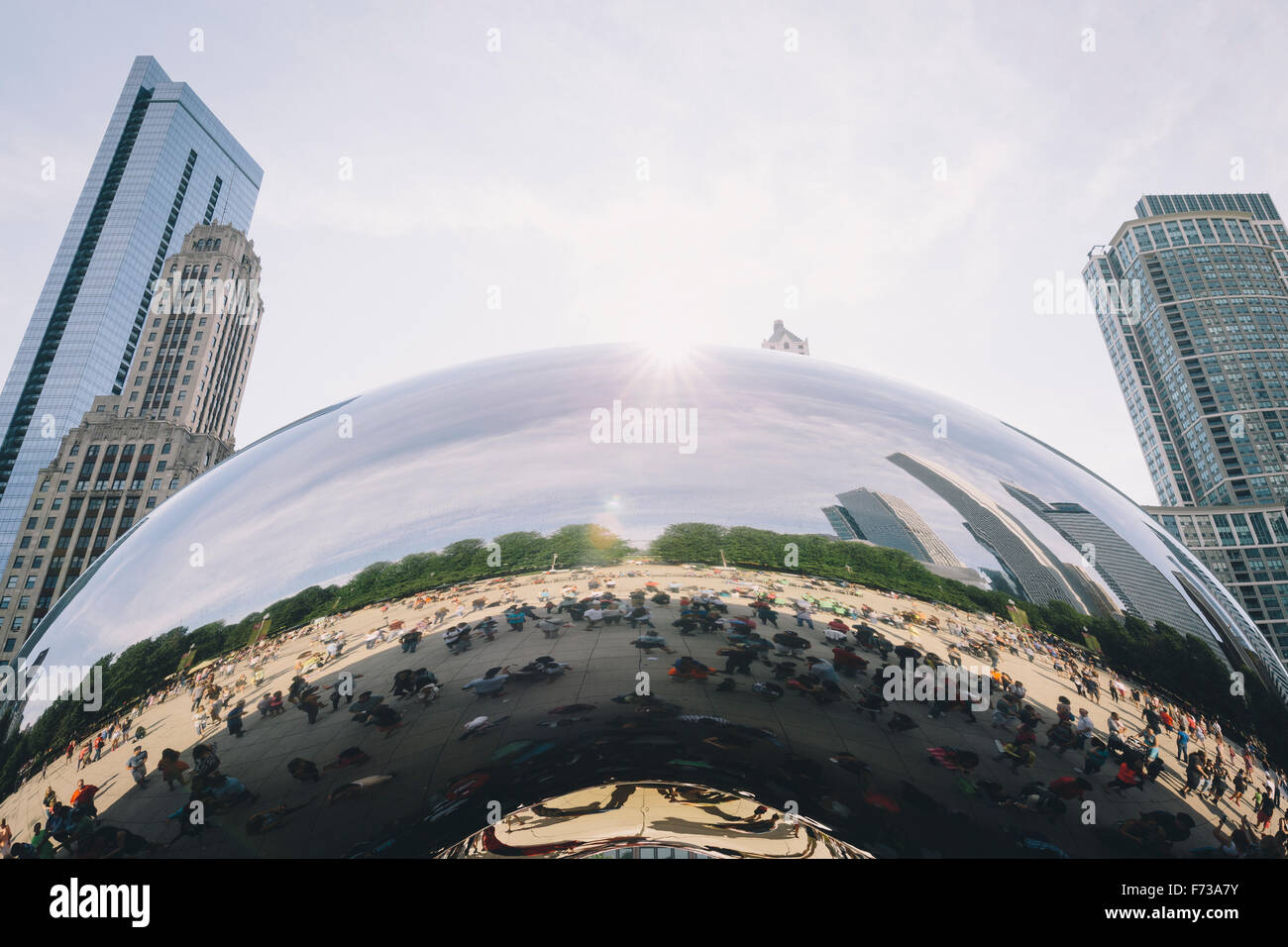 Cloud Gate (aka The Bean) in Chicago reflects the tourists and visitors