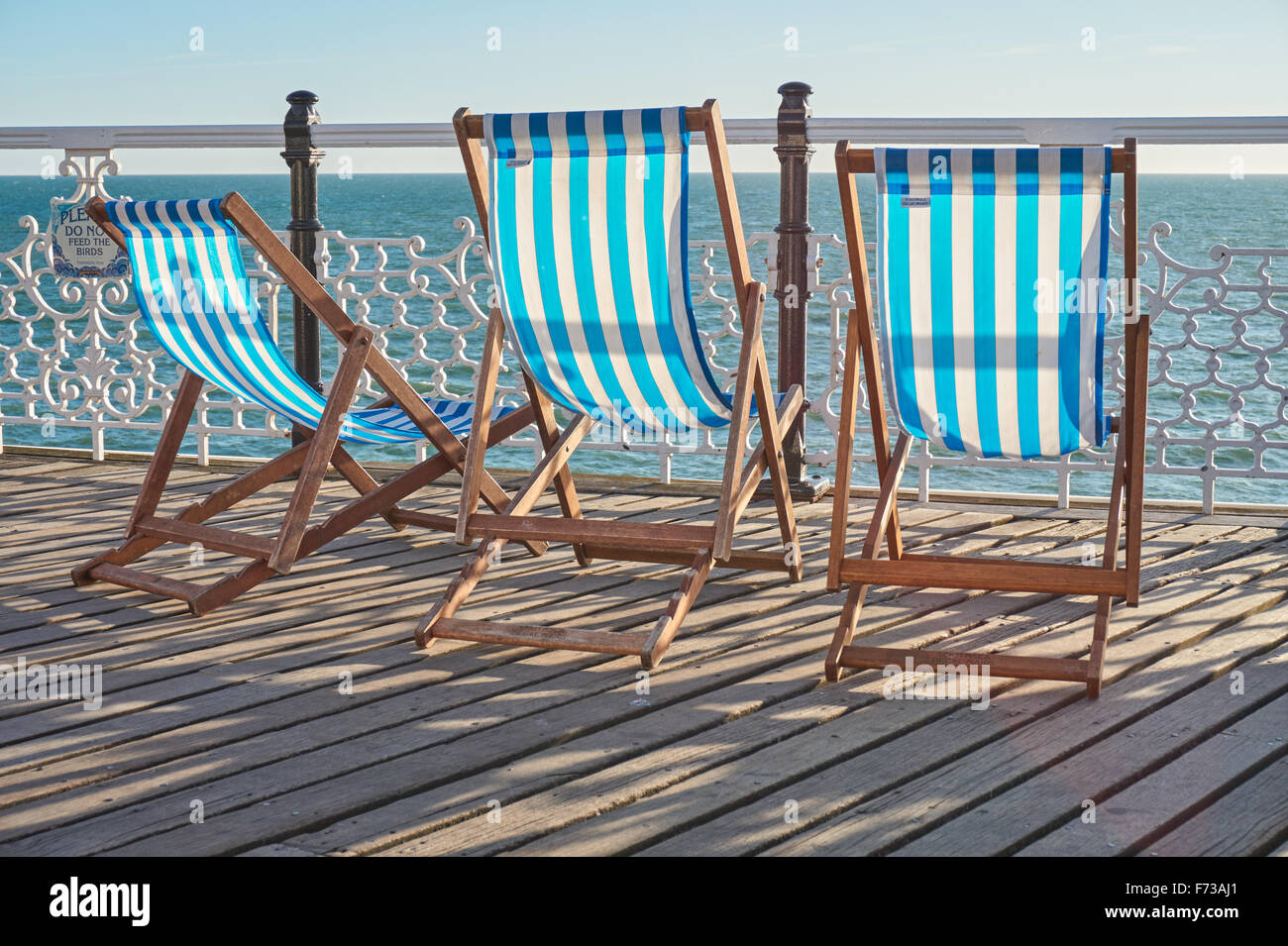 Empty deckchairs on Brighton Pier, East Sussex England United Kingdom UK Stock Photo