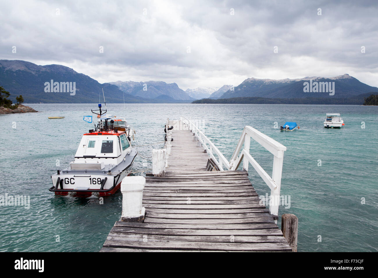 Dock with boats at Lago Nahuel Huapi at Villa La Angostura, Patagonia. Stock Photo