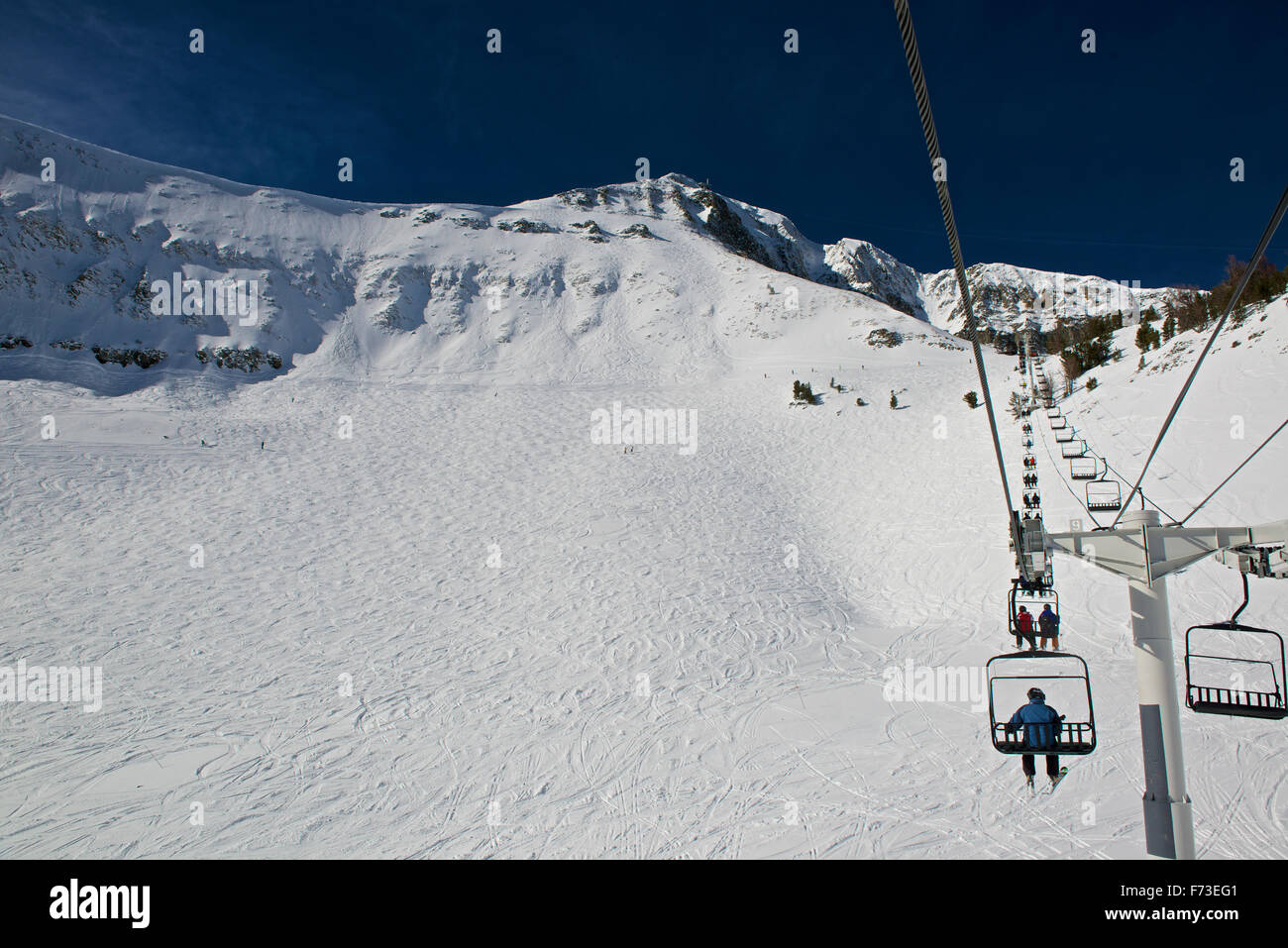The Lone Peak Triple ski lift at Big Sky Resort Stock Photo