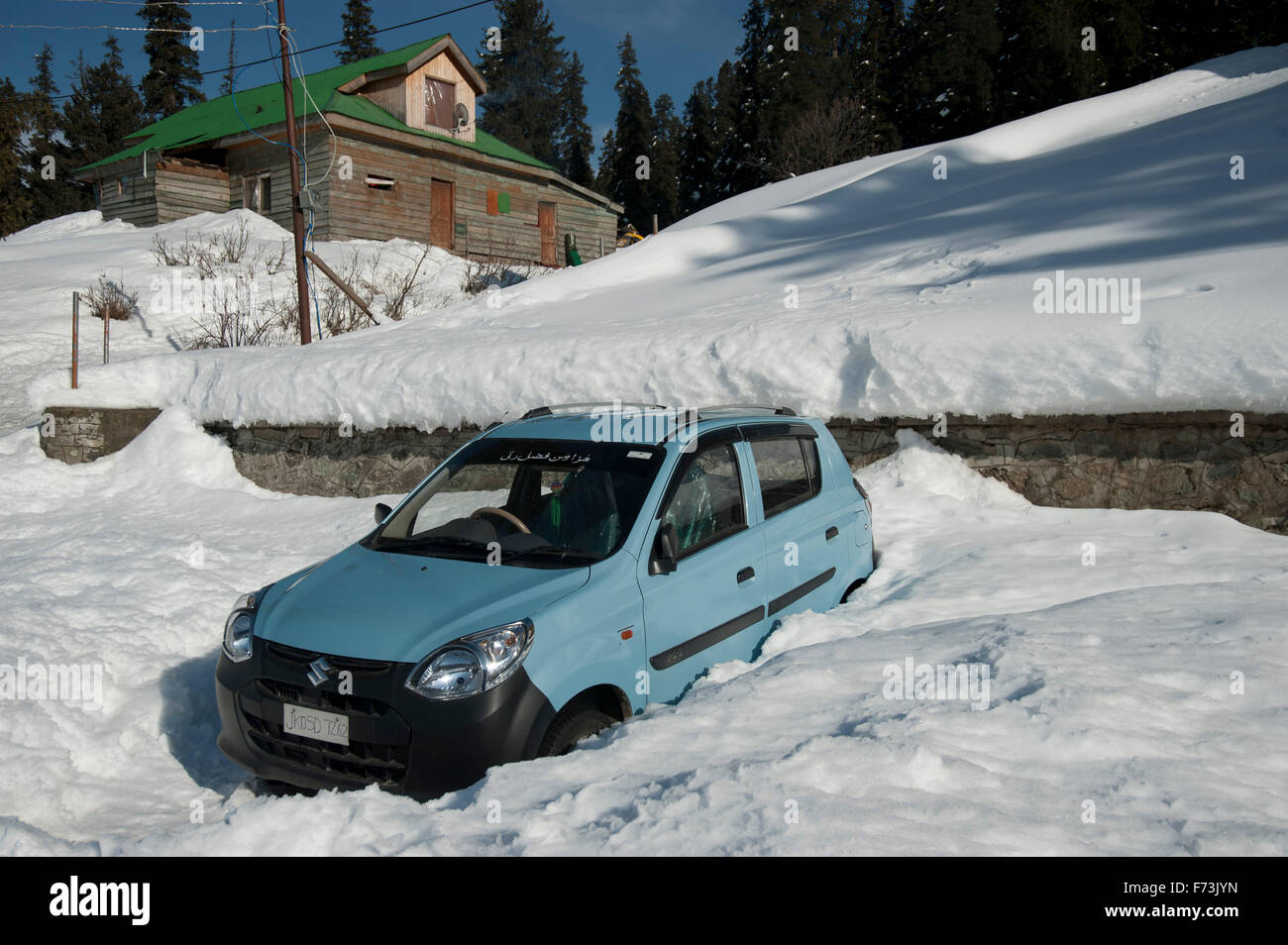 Car stuck in snow covered road, gulmarg, kashmir, india, asia Stock Photo
