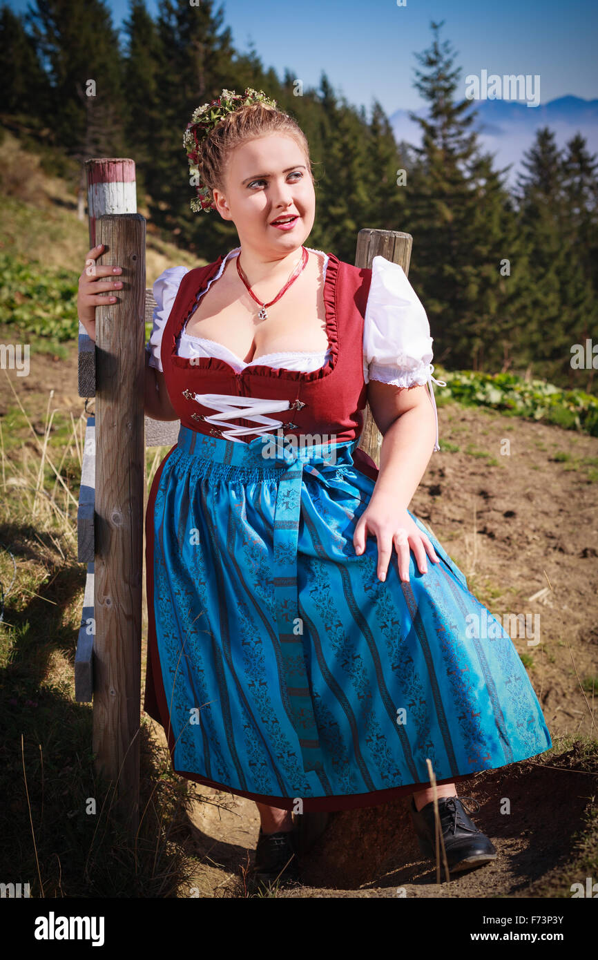 Portrait of a young farmer in the mountains with festive costume Stock Photo