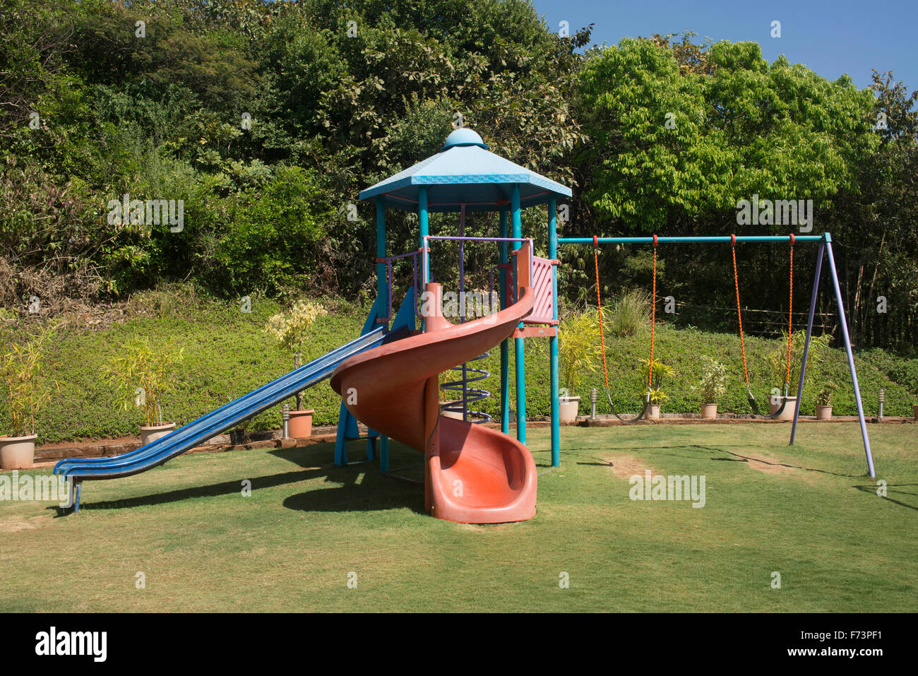 children playground, slides and swings, lavasa, pune, maharashtra, india, asia Stock Photo