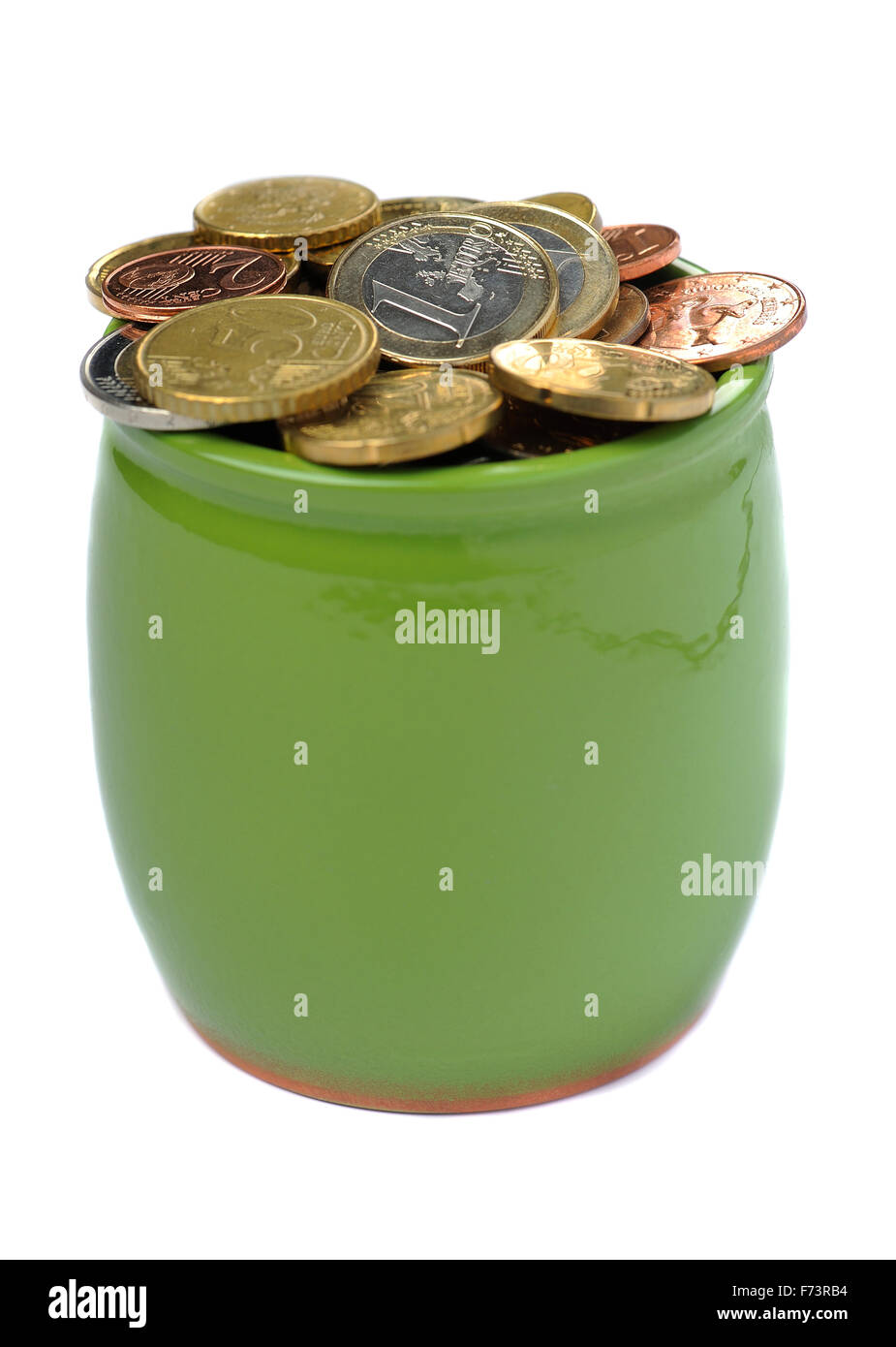 Ceramic green pot full of euro coins, closeup Stock Photo