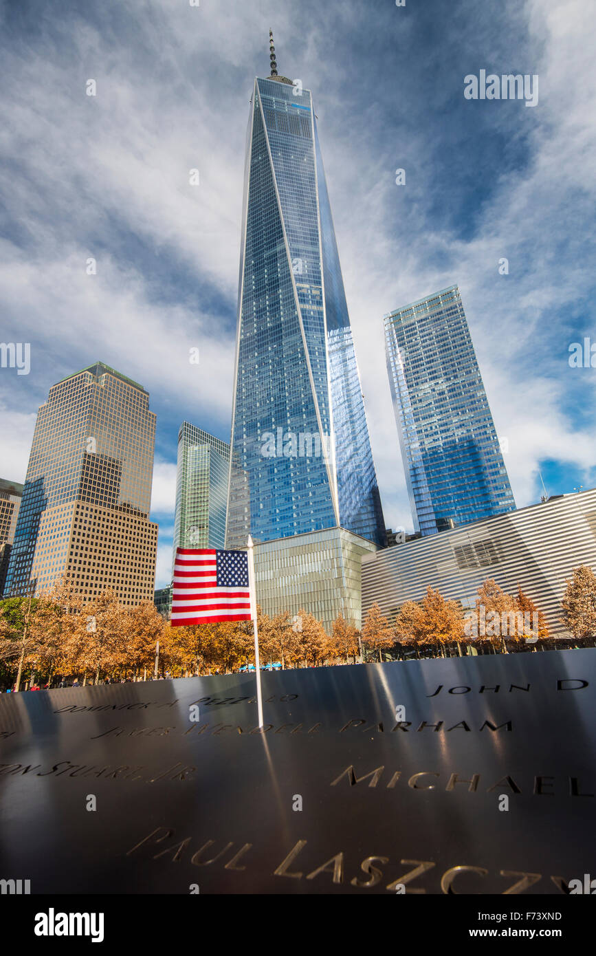 National September 11 Memorial & Museum with One World Trade Center or Freedom Tower behind, Lower Manhattan, New York, USA Stock Photo