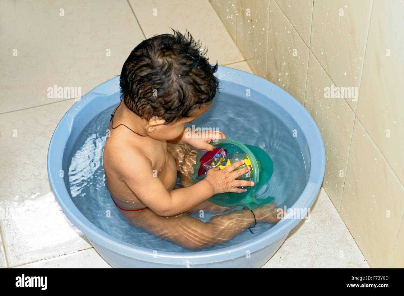 Baby Bathing India High Resolution Stock Photography And Images Alamy