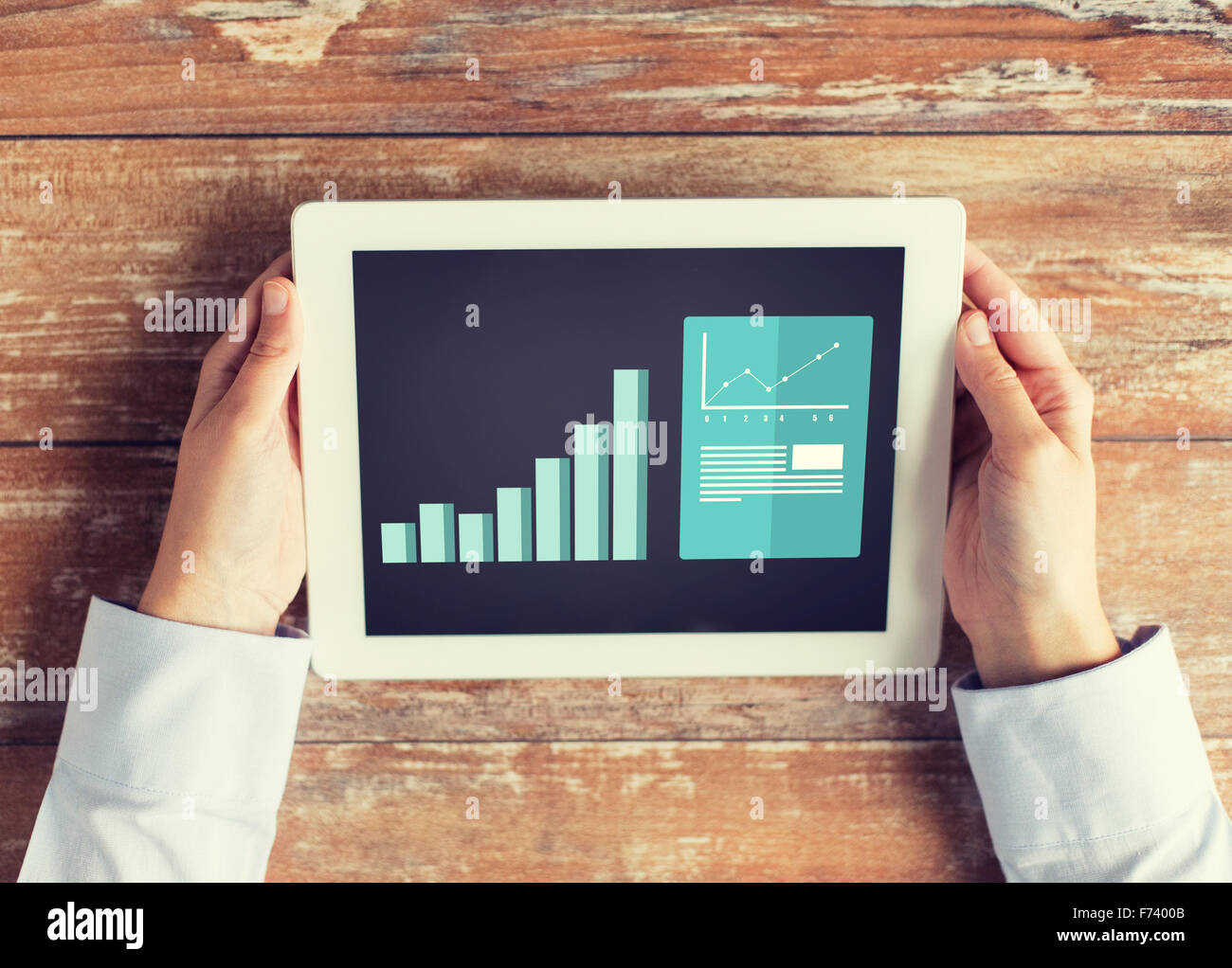 close up of female hands with charts on tablet pc Stock Photo - Alamy