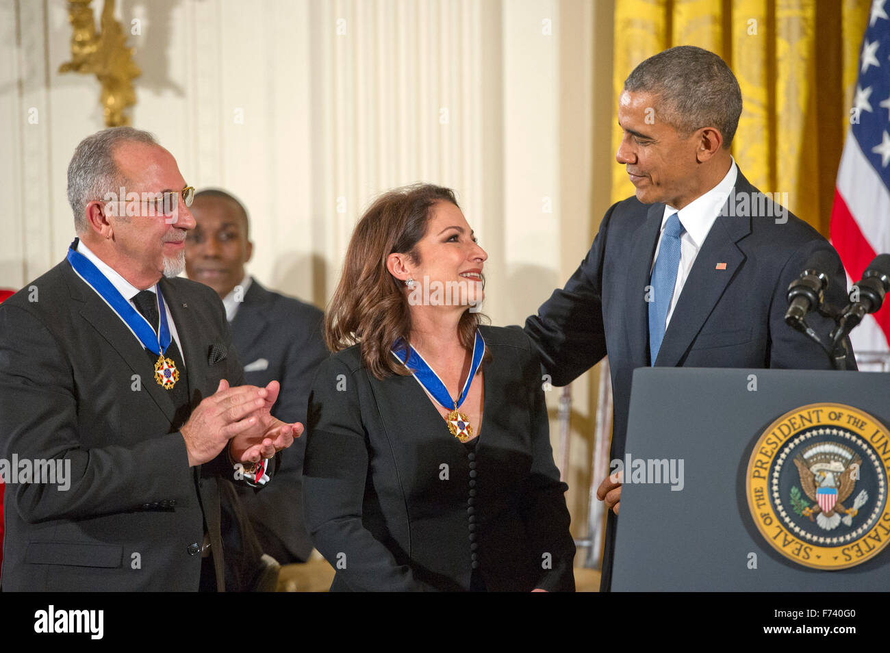 Gloria and Emilio Estefan receives the Presidential Medal of Freedom from United States President Barack Obama during a ceremony in the East Room of the White House in Washington, DC on Tuesday, November 24, 2015. The Medal is the highest US civilian honor, presented to individuals who have made especially meritorious contributions to the security or national interests of the US, to world peace, or to cultural or significant public or private endeavors. Photo: Ron Sachs/CNP/dpa - NO WIRE SERVICE - Stock Photo
