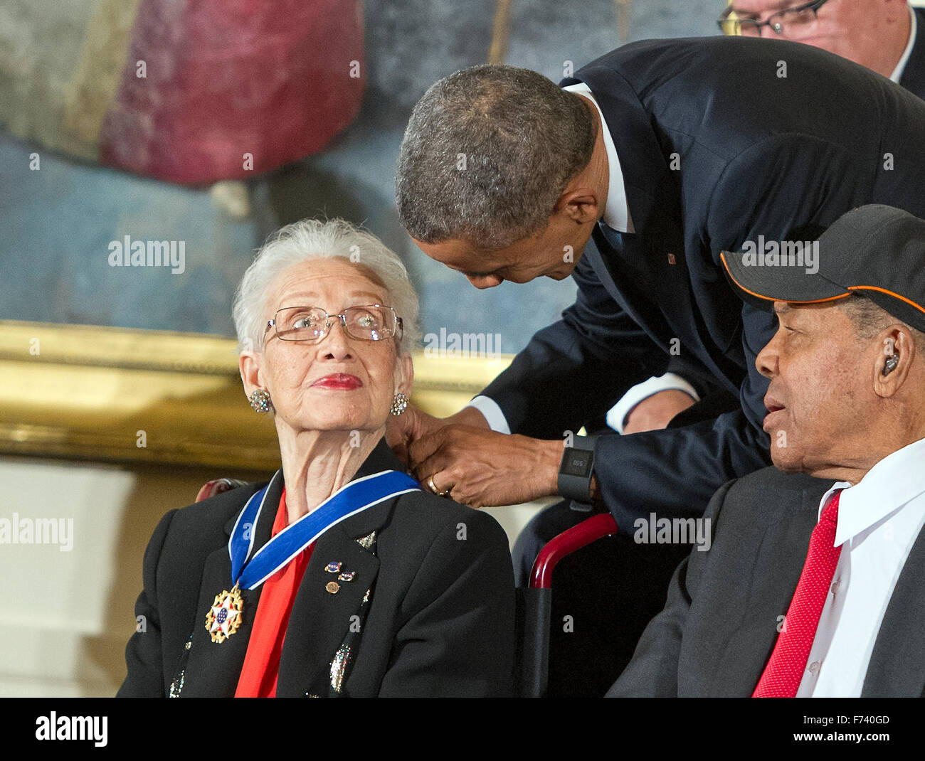 Katherine G. Johnson, a NASA mathematician, receives the Presidential Medal of Freedom from United States President Barack Obama during a ceremony in the East Room of the White House in Washington, DC on Tuesday, November 24, 2015. The Medal is the highest US civilian honor, presented to individuals who have made especially meritorious contributions to the security or national interests of the US, to world peace, or to cultural or significant public or private endeavors. Photo: Ron Sachs/CNP/dpa - NO WIRE SERVICE - Stock Photo