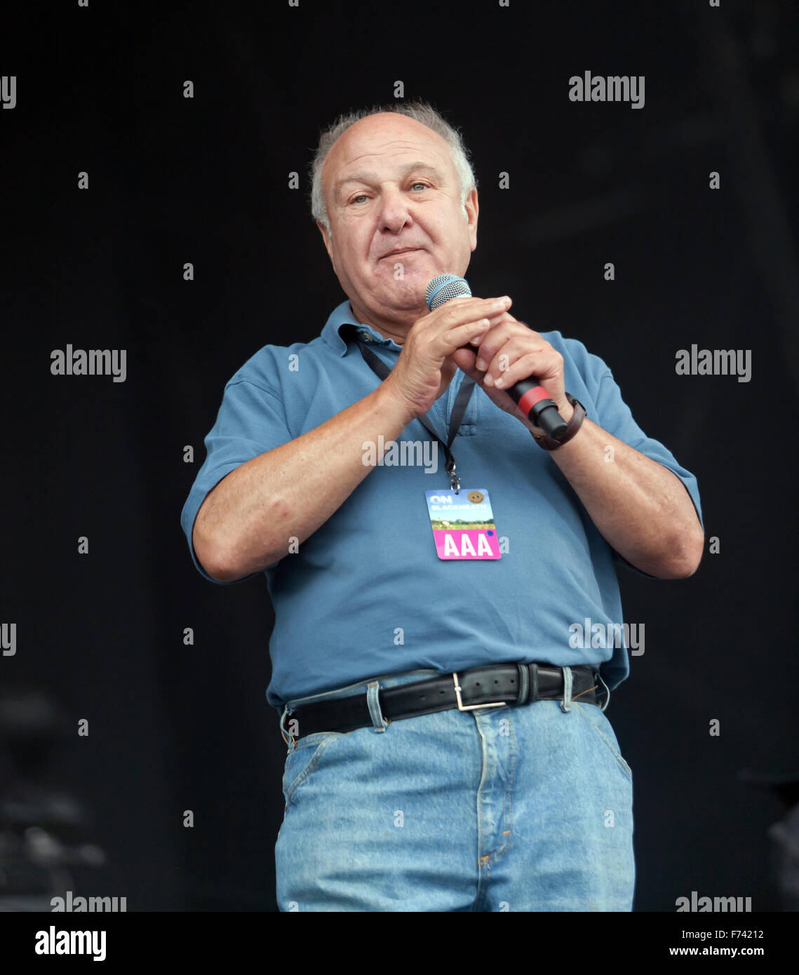 Harvey Goldsmith CBE, making stage announcement's on the Main Stage, at the start of the 'On Blackheath' music festival. Stock Photo