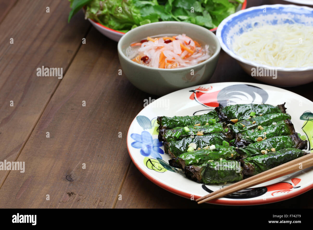 grilled minced beef wrapped in betel leaf, vietnamese cuisine, thit bo nuong la lot Stock Photo