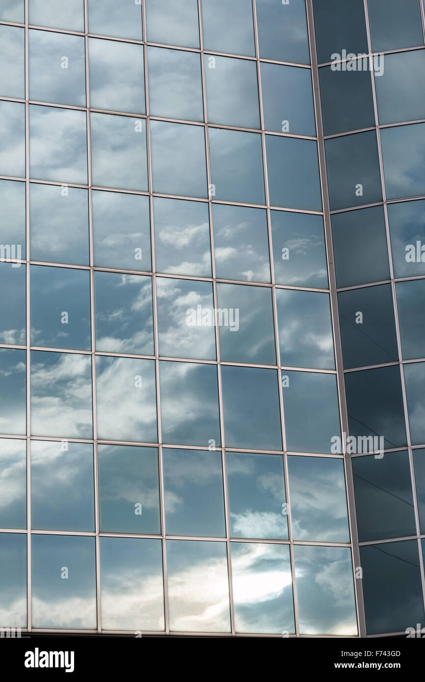 Blue Sky and Clouds Reflected in the Glass Building Stock Photo - Alamy