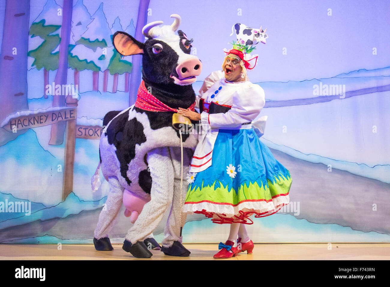 Hackney Empire Theatre, London, November 25th 2015.  Hackney Empire presents Jack and the Beanstalk as their 2015 Christmas pantomime. London’s most famous panto will star Hackney Empire’s own Olivier nominated dame Clive Rowe as Dame Daisy Trott, Olivier Award-nominated Bodyguard actress Debbie Kurup as Jack and Hackney Panto favourite Kat B as Snowman. Written and directed by Creative Director Susie McKenna, with music by Steven Edis. PICTURED: Clive Rowe as Dame Daisy Trott with Cow. Stock Photo