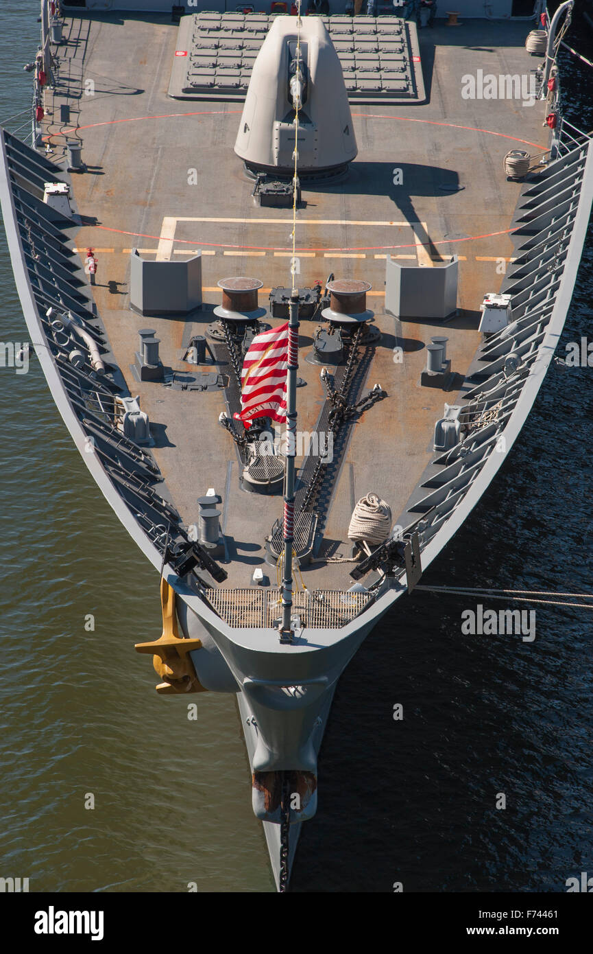 The bow of a grey US warship sailing in the sea Stock Photo