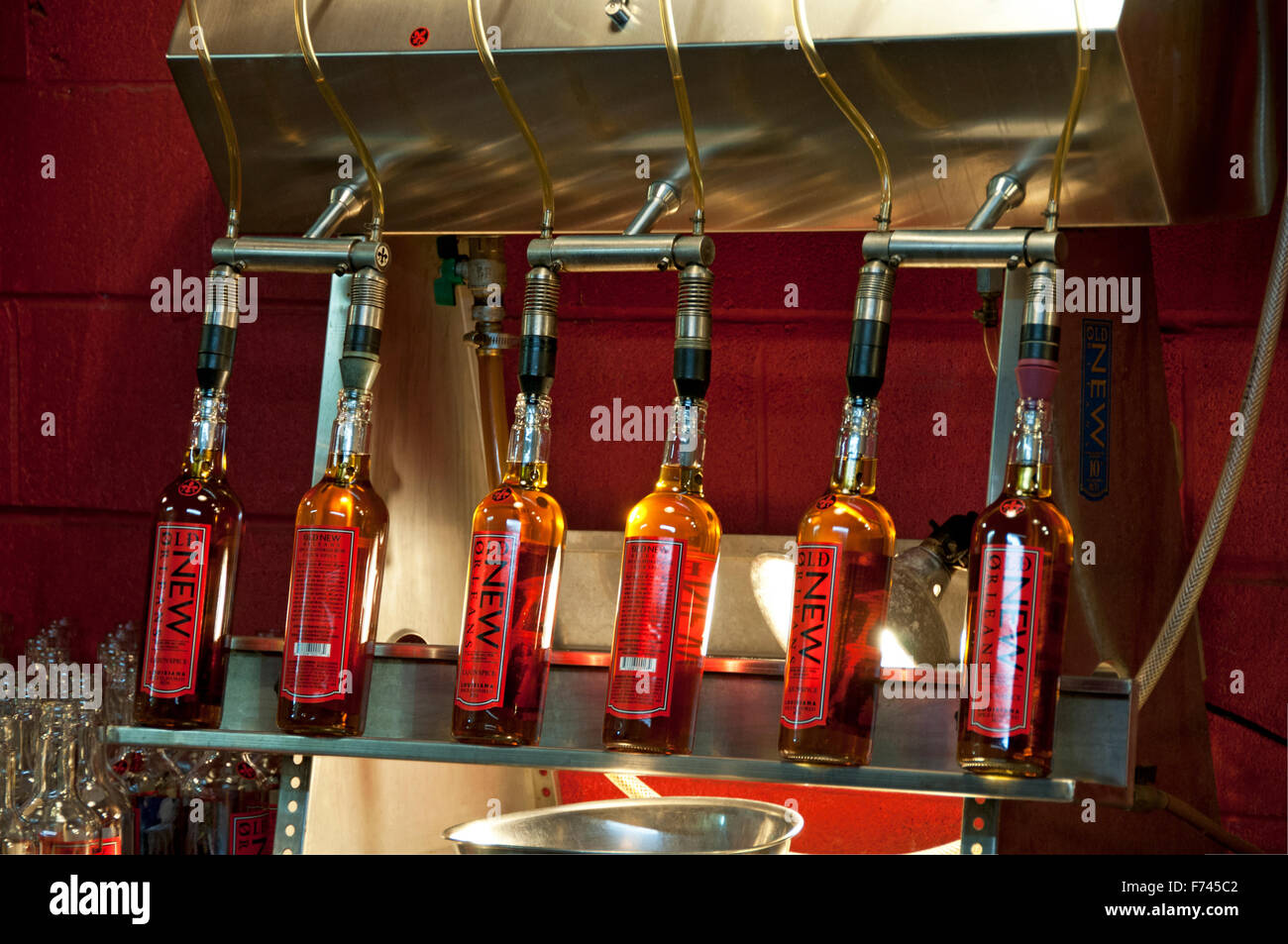 glass liquor bottles bring filled Stock Photo