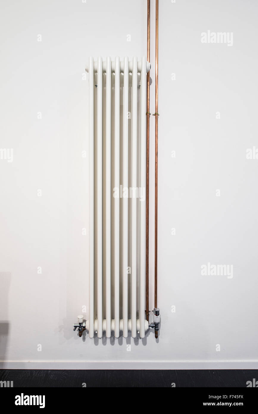 Wall mounted radiator hi-res stock photography and images - Alamy