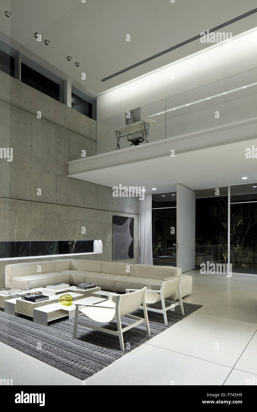 open-plan-double-height-living-room-in-modern-white-house-israel-middle-east-stock-photo-alamy