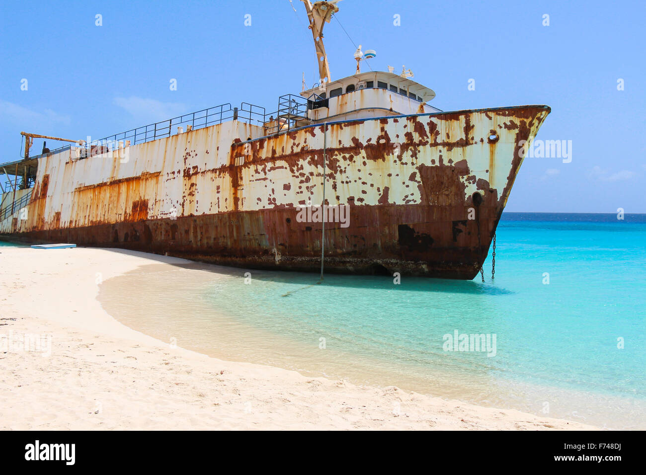 Stranded Shipwreck on Caribbean Beach, Turks and Caicos Islands Stock Photo