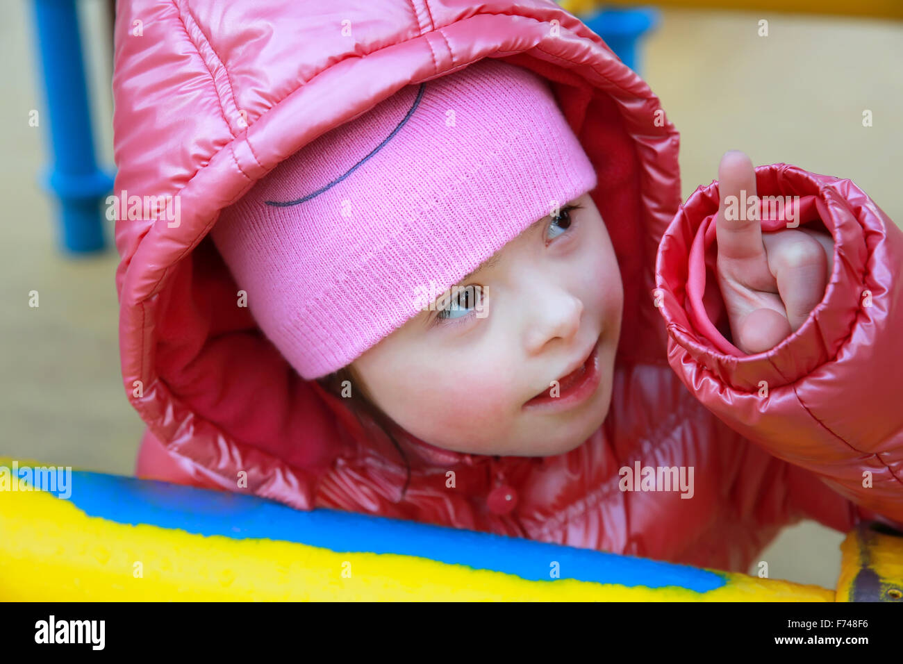 Portrait of beautiful girl on the playground Stock Photo - Alamy