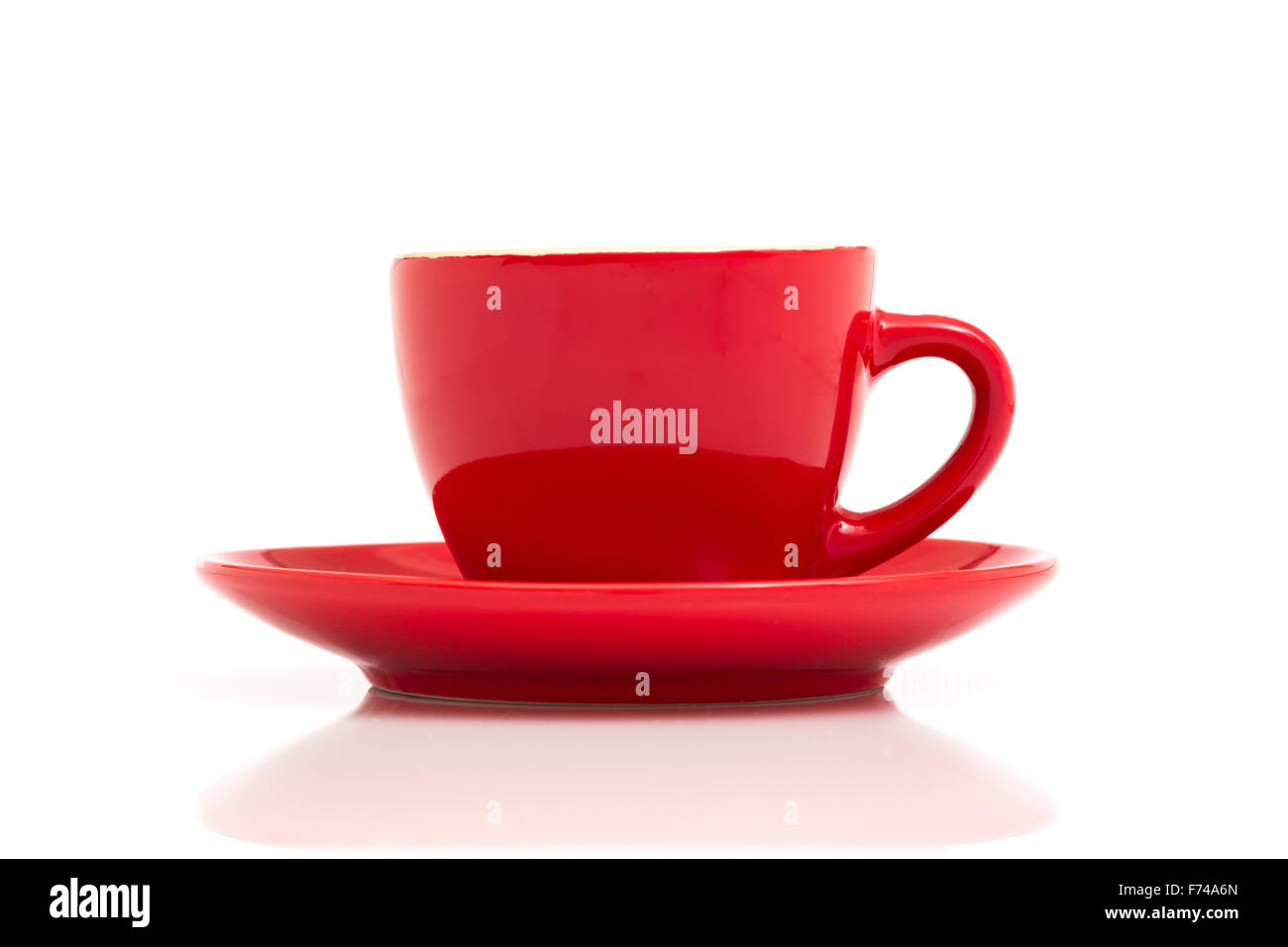 Red espresso cup and saucer isolated on white background Stock Photo