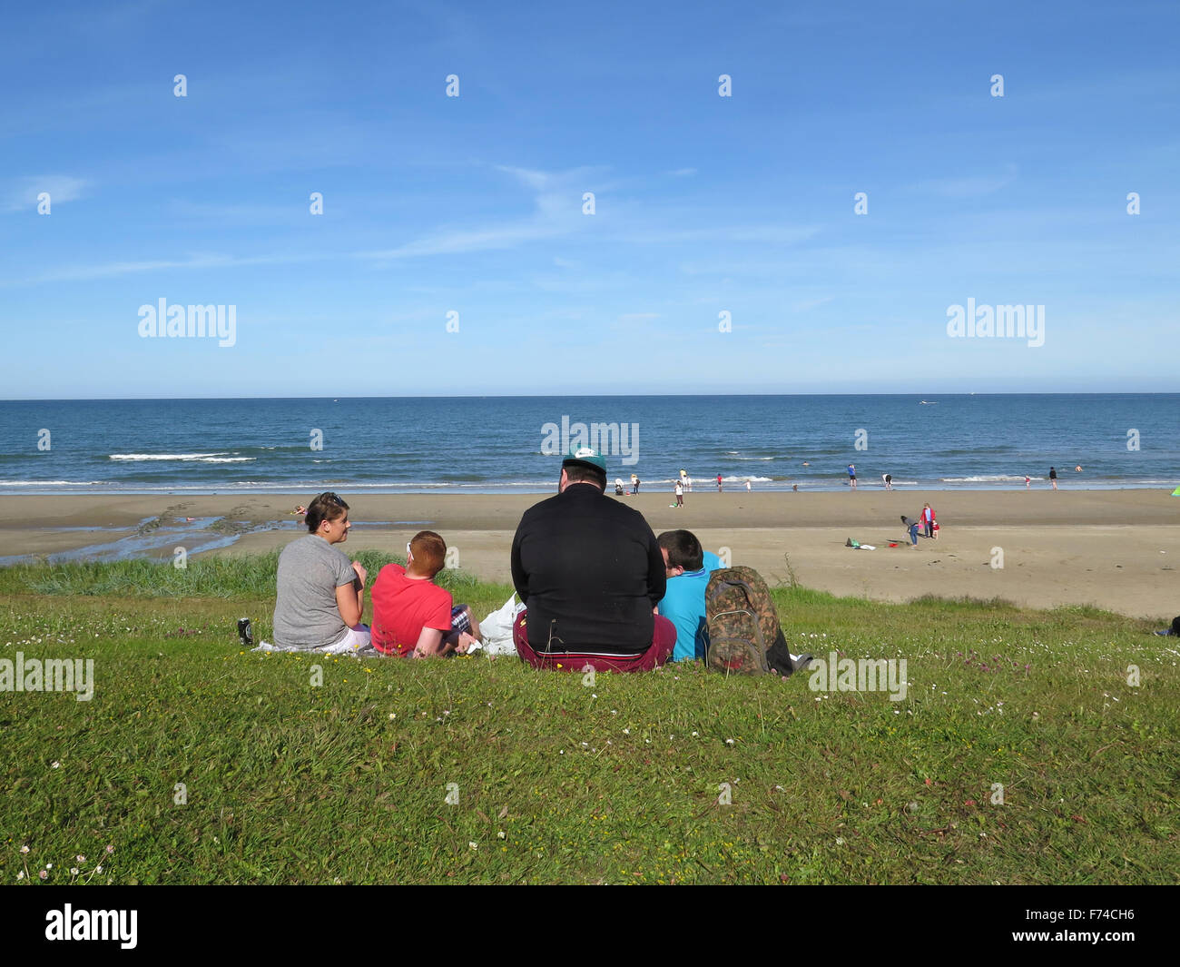 Fat bloke on Portmarnock Beach, Dublin Stock Photo