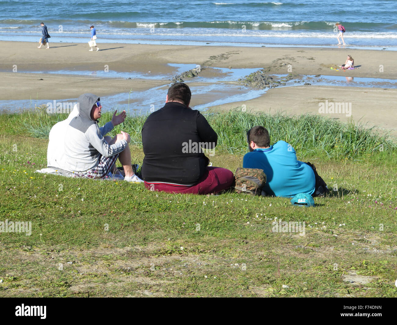 Fat bloke on Portmarnock Beach, Dublin Stock Photo