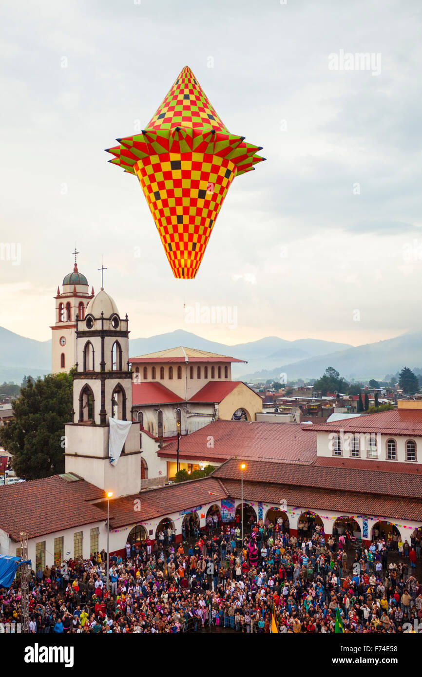 A large sky lantern floats upwards over Paracho, Michoacan, Mexico during the annual Globos de Cantoya festival. Stock Photo
