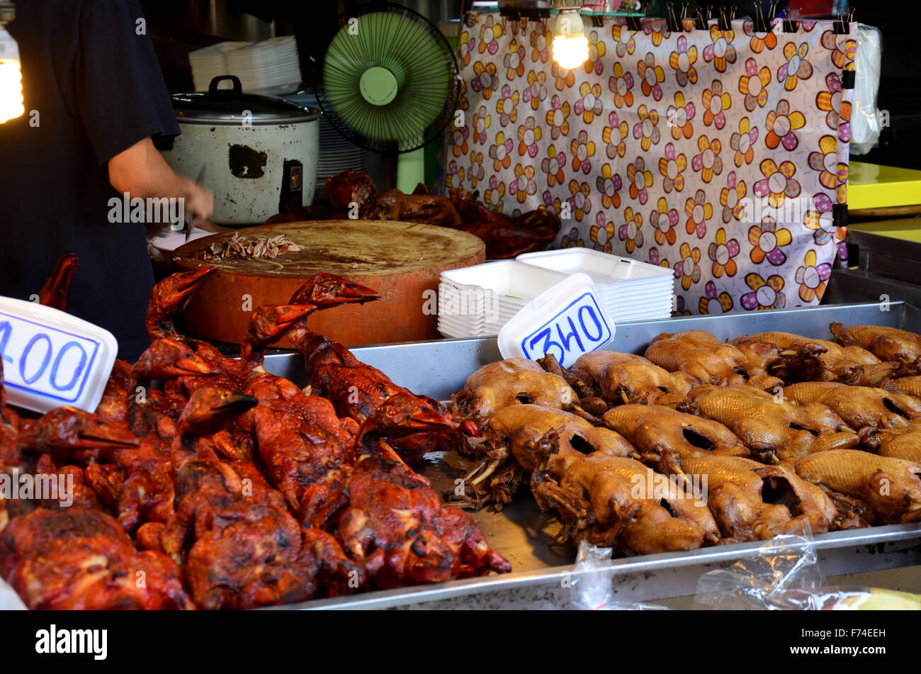 Potstewed duck and roast duck for sale at Don Wai Floating Market in Nakhon Pathom, Thailand
