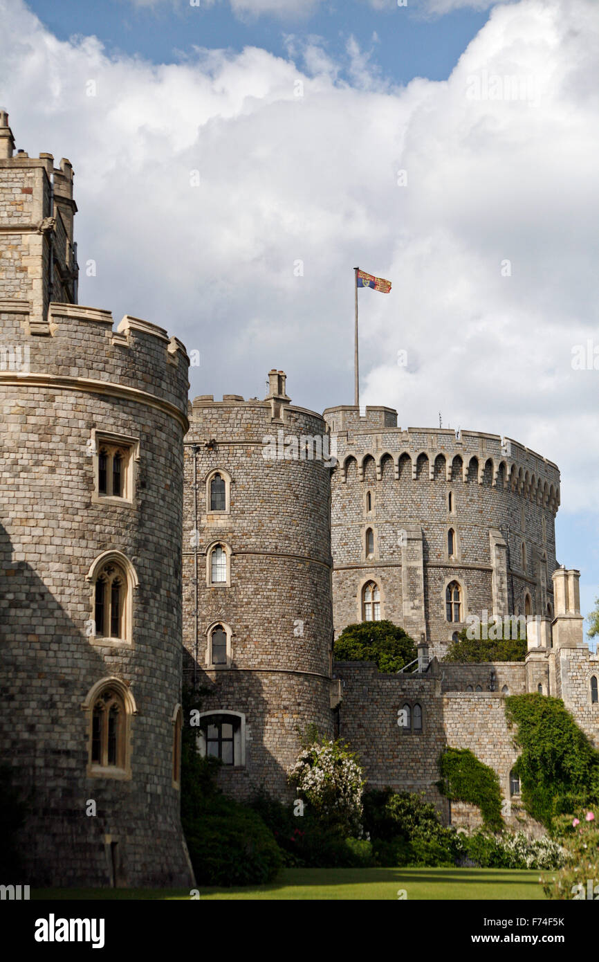 Windsor castle with royal standard flag flying at top of mast denoting queen in residence Stock Photo