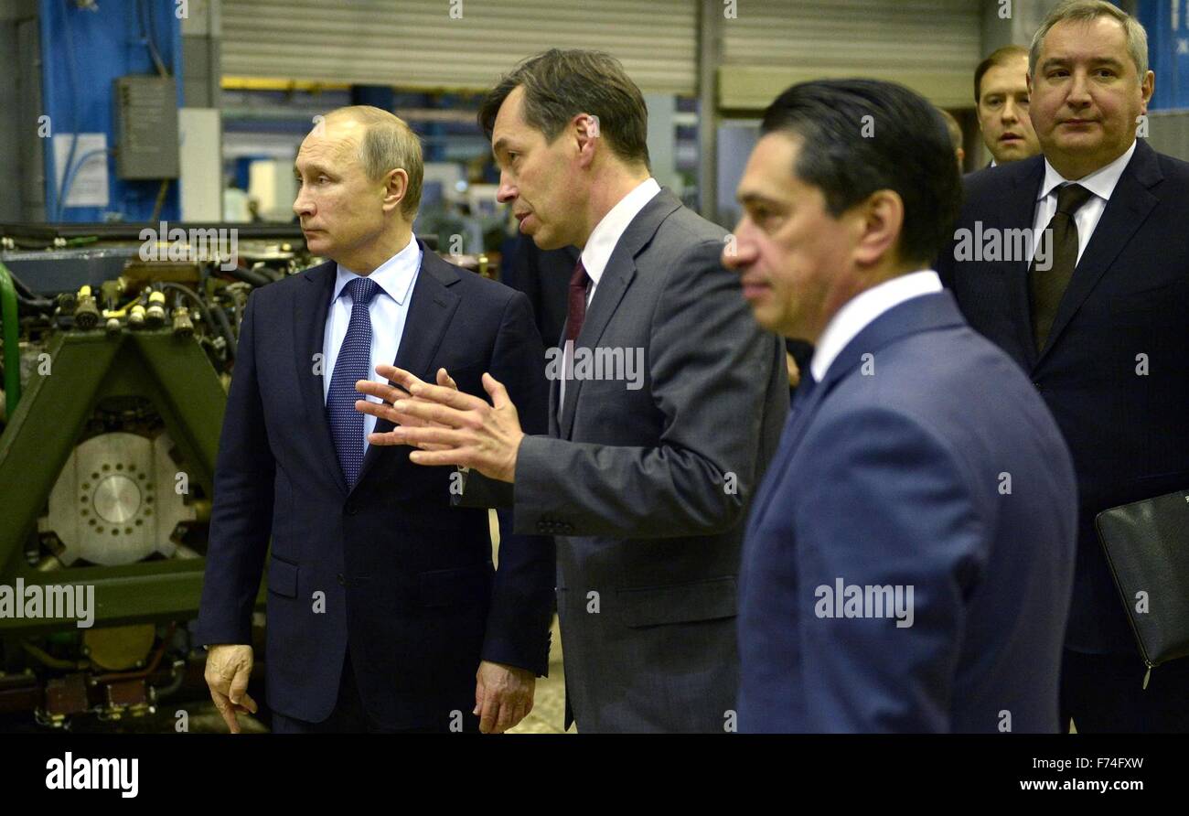 Russian President Vladimir Putin is given a tour of the UVZ  military design center by Principal Design Engineer Andrei Terlikov and Uralvagonzavod General Director Oleg Siyenko November 25, 2015 in Nizhny Tagil, Russia. The center develops and builds military hardware including the UVZ armored fighting vehicles, T-90 tank and upgrades to the T-72 battle tank. Stock Photo