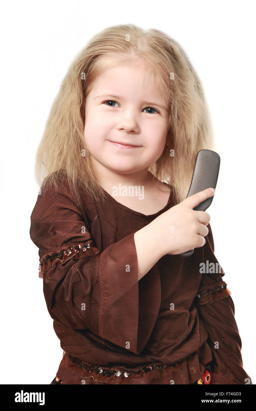The girl brushes hair Stock Photo Alamy