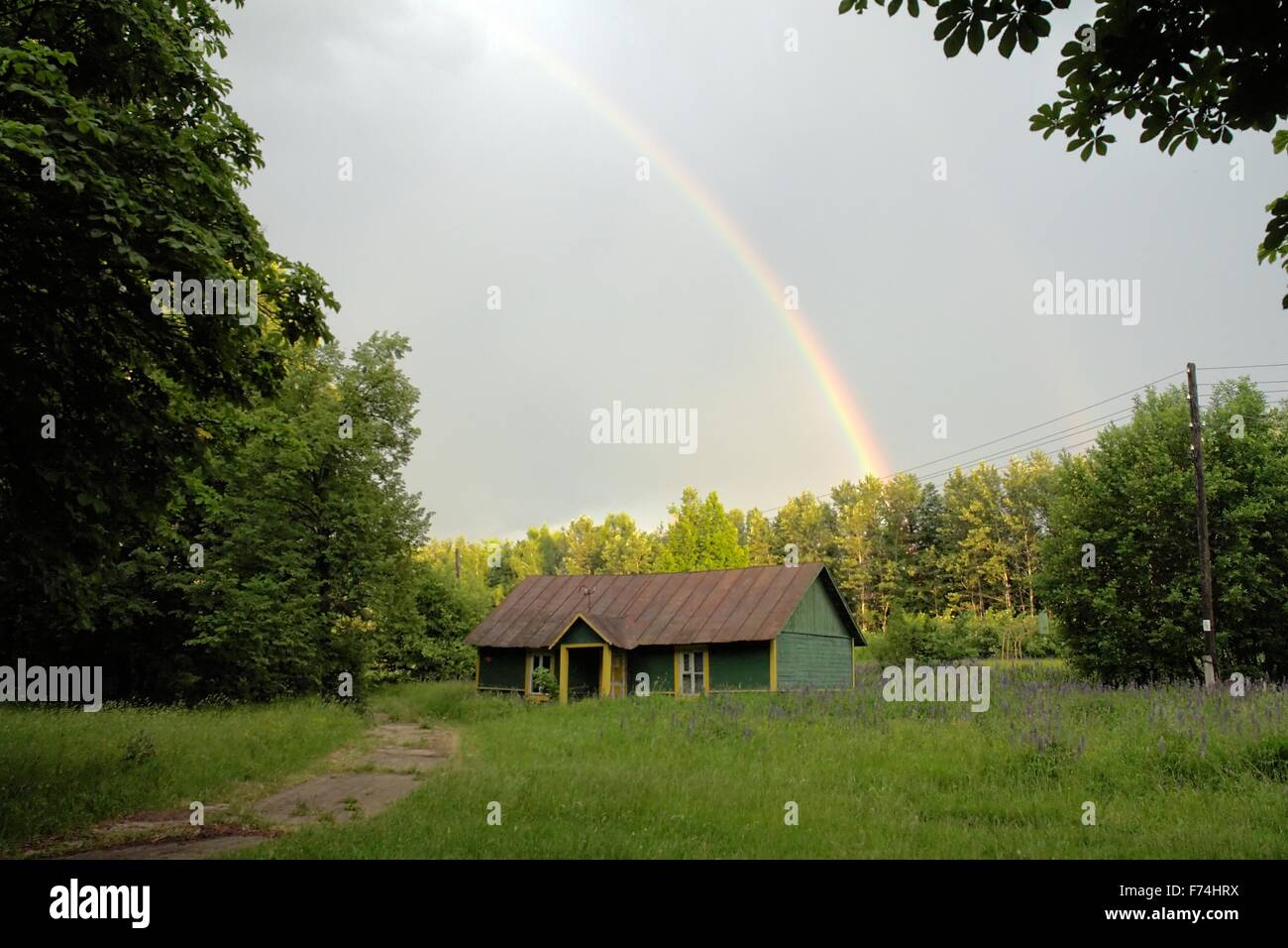 Rainbow after rain Stock Photo - Alamy