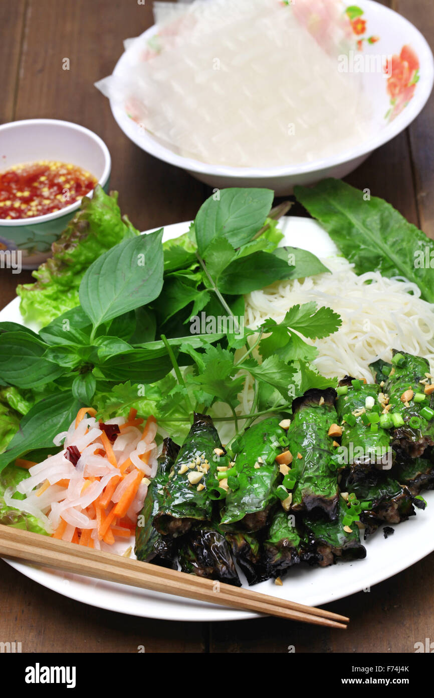 grilled minced beef wrapped in betel leaf, vietnamese cuisine, thit bo nuong la lot Stock Photo