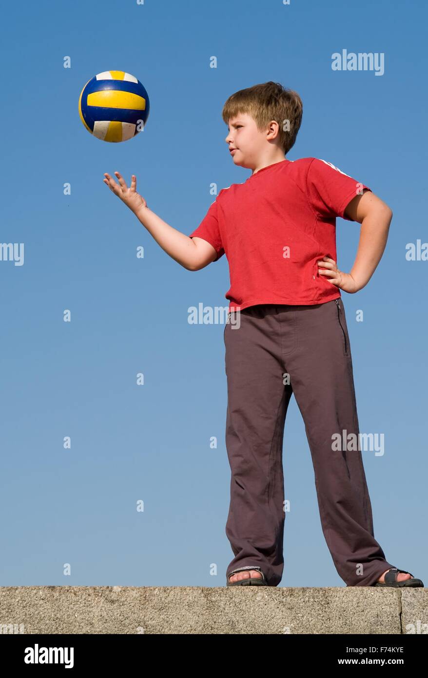 boy throws ball Stock Photo Alamy