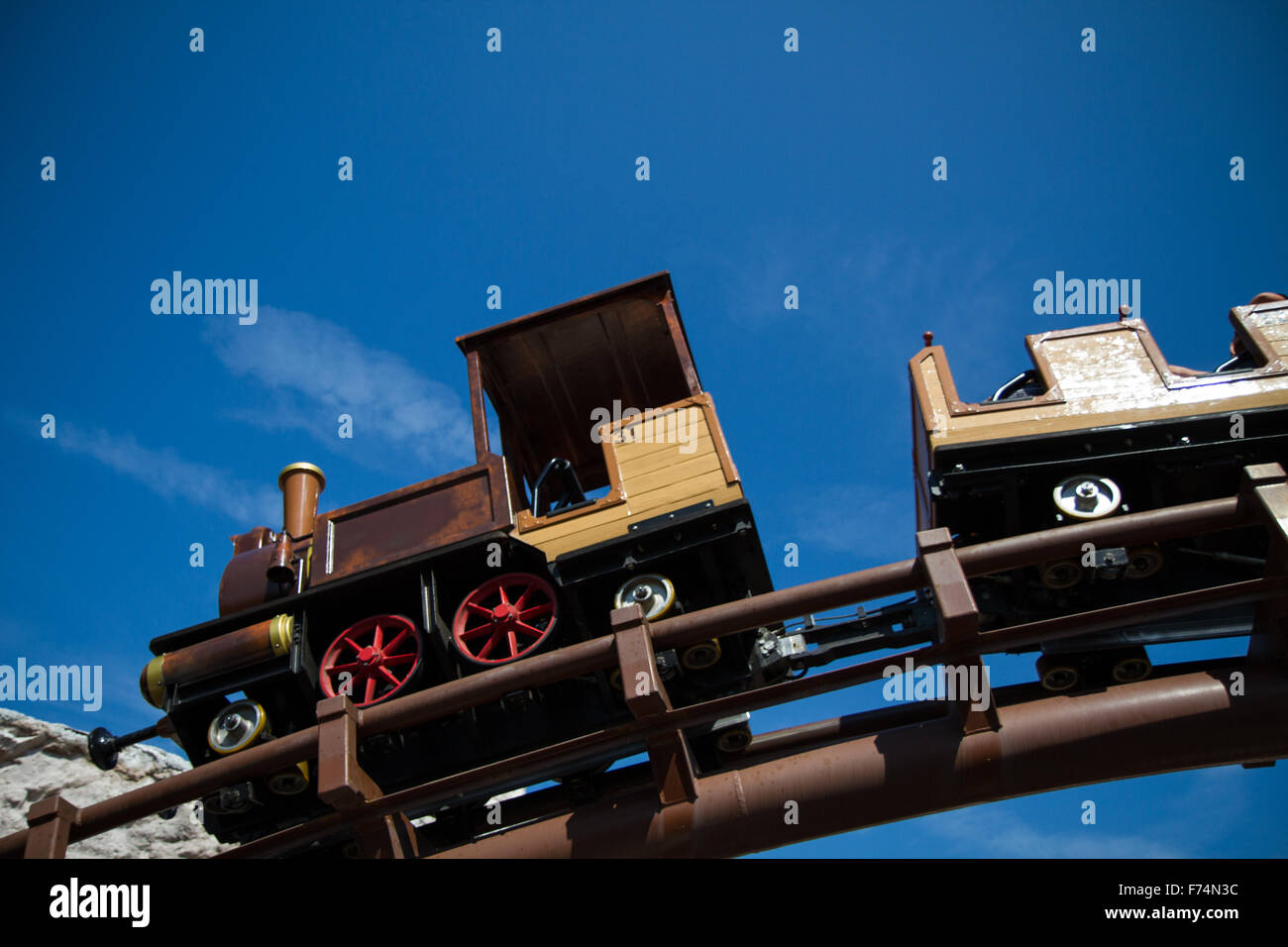 detail of roller coaster steam locomotive old west Stock Photo