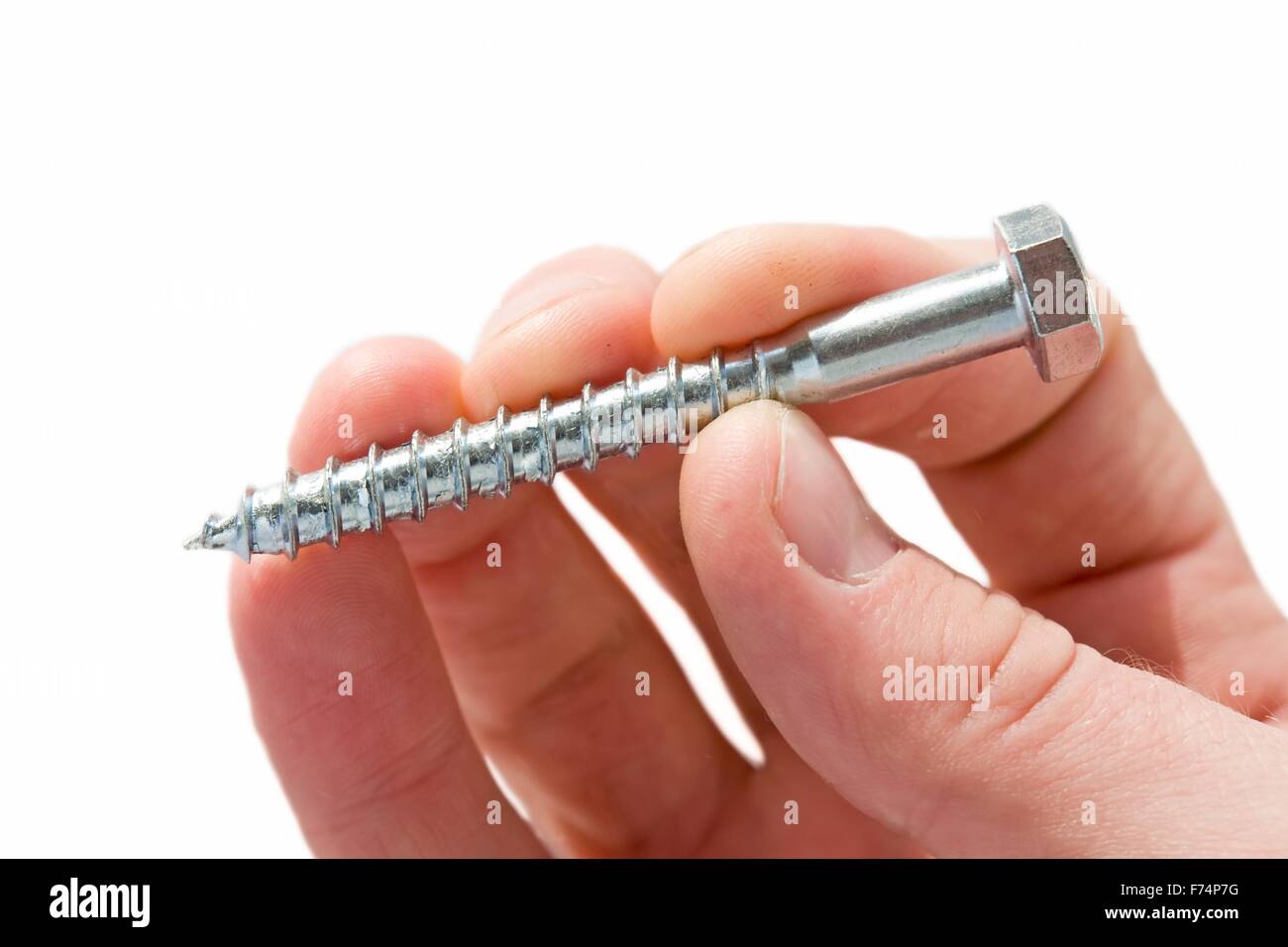 Hand with screw Stock Photo Alamy
