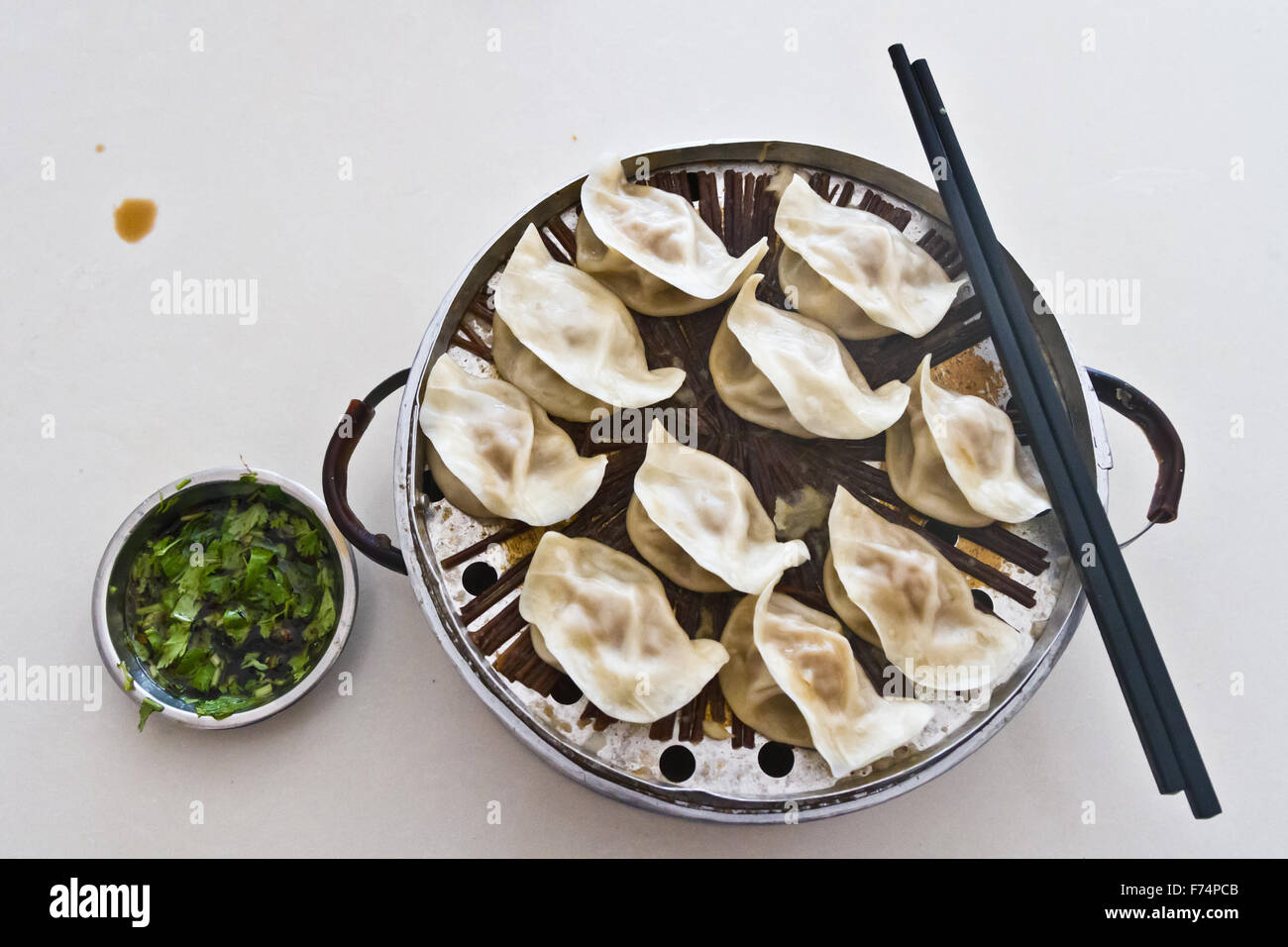 Typical steamed jiaozi dumplings, typical Chinese food everywhere in the country - Stock Image